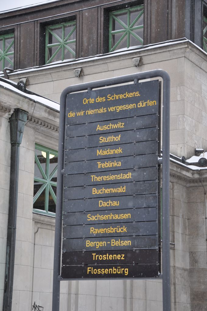 Memorial plaques and sign for people deported from Berlin