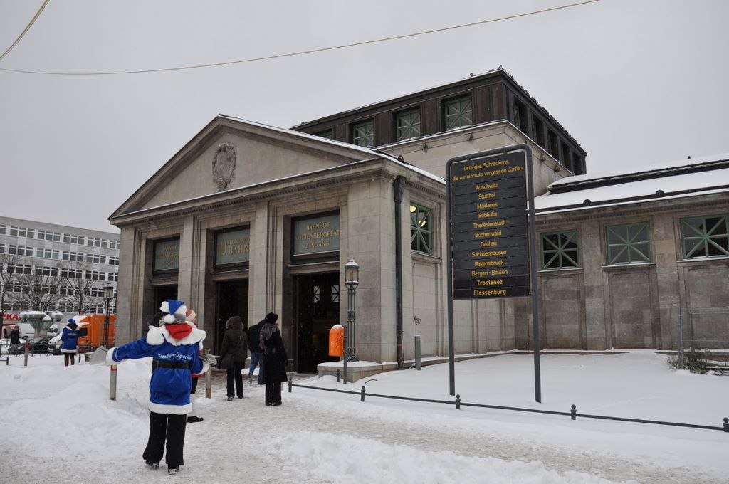 Memorial plaques and sign for people deported from Berlin